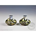 A pair of Moorcroft Puffin pattern squat vases, 10.