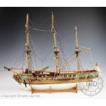 A model of a three masted sailing ship,