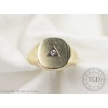 A 9ct gold and diamond set signet ring, gross weight 8.