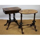 A Victorian carved and inlaid walnut occasional table, with oval top, on scroll legs,