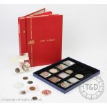 An album of world silver and copper coins together with a Westminster box,