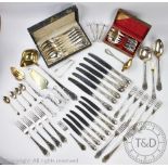A fifty piece part suite of German silver plates flatware, with Rococo style scroll handles,