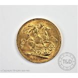 A Queen Victoria gold sovereign dated 1887,