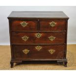 A George III and later oak and pine chest, with two short and two long drawers,
