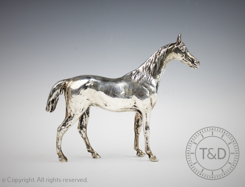 A sterling silver model of a horse, realistically designed standing with textured mane and tail, - Image 3 of 4