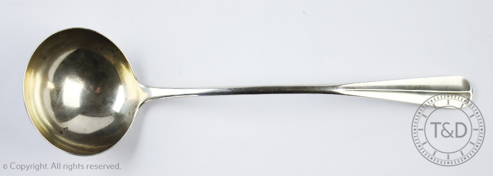 A George V silver sauce ladle, Elkington & Co, Birmingham 1916, 30cm long,