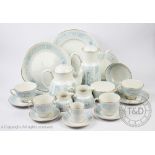 A Royal Doulton Hampton Court pattern seventy eight piece part tea and coffee service with dinner