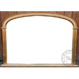 A modern over mantel mirror, serpentine top with gilt frame, 85cm H x 129cm W,