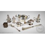 A selection of assorted silver to include a novelty table lighter designed as a genie lamp with