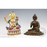 A Tibetan bronze model of Buddha, modelled seated in the vitarka mudra position,