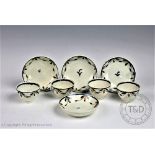 A set of four 18th / early 19th century English pearlware tea bowls and saucers,