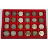 A collection of twenty four mainly 19th century European coins and others,