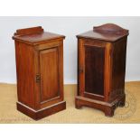 Two Edwardian mahogany bedside cupboards, with panelled doors, on plinth bases,