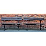 Two similar painted wood and cast iron garden benches,