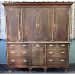 A late Victorian oak housekeepers cupboard,