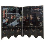 PARAVENTO a sei ante in legno ebanizzato con decori raffiguranti "Scena di vita orientale" (