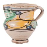 BROCCA in ceramica smaltata e decorata. Sicilia XIX secolo Misure: h cm 15