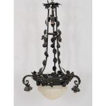 LAMPADARIO Liberty in ferro battuto con boccia in vetro. Primi ‘900 Misure: h cm 107