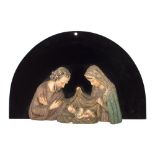 CAPEZZALE in schiuma di gesso raffigurante "Sacra Famiglia" montato su pannello in vetro. XX