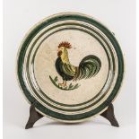 FANGOTTO in ceramica smaltata e dipinta nei toni del bianco e del verde raffigurante "Gallo".