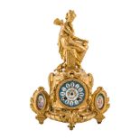 OROLOGIO in bronzo dorato con placchette in porcellana di Sevres dipinta a mano raffiguranti "