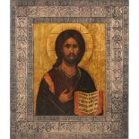 ICONA stampata raffigurante "Cristo" con bordure in metallo argentato. XX secolo Misure: cm 50,5 x