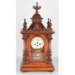 Large antique German walnut calendar clock. Clockwork is running. Calendar bands throughout.
