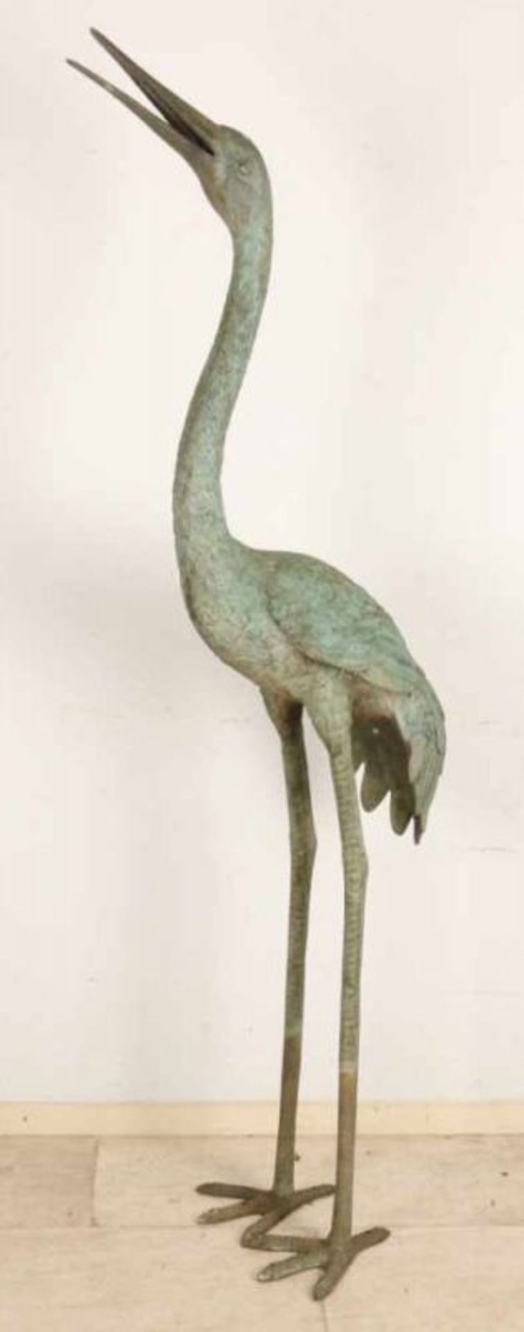 Life-size bronze crane. Second half of the 20th century. Size: H 170 cm. In good condition.