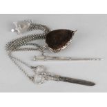 Silver chatelaine with scissors, knitting stitch, skirt hook and pincushion, 833/000. Frisian