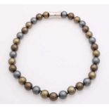 Pearl necklace with pearls in gray, green and brown tones, made of shells, ø12 mm, length 46 cm.