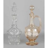 Two antique glass carafes. First half of 20th century. One crystal, chips. Once mouth-blown glass,