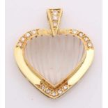 Golden pendant, 585/000, in the shape of a heart, set with moonstone and diamond. Pendant with