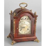 Carrot nut table clock with moon phase and bronze fixtures. Second half of the 20th century. Size: