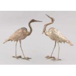 Two silver herons, 915/000, Spain. 18x5x16cm. total ca 143 grams. In good condition Zwei silberne