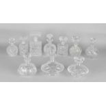 Ten small crystal cork decanters, diverse. 20th century. Minimum chip possible. Size: 14 - 18 cm. In