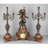 Beautiful large antique French clock set Par Bouchon, with putti and 3-light candlesticks and red
