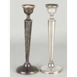 Two silver candlesticks, 925/000, on round base with fillet edge. ø10x26 cm. Some dented and at