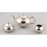 Silver tea set, 835/000, tea jug milk jug and sugar bowl, round smooth model. The tea jug is