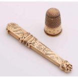 Yellow gold needle case and thimble, 585/000 ,. Rendered needle case beautifully decorated with