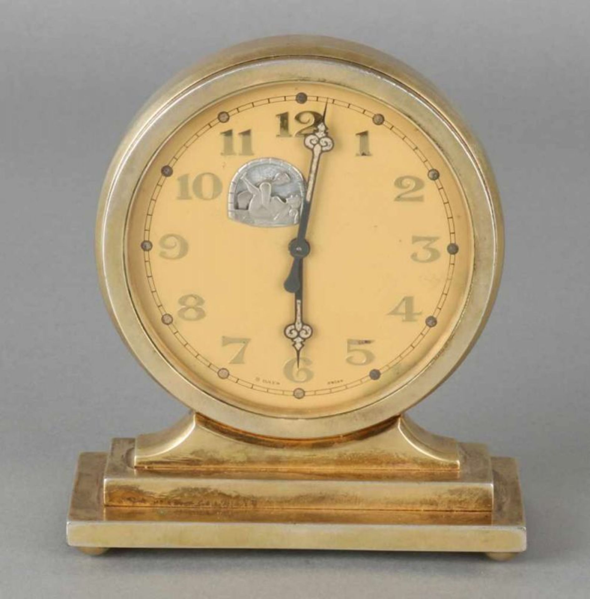 Swiss brass desk clock with erotic representation. Circa: 1930. Clock has eight-day double-sided