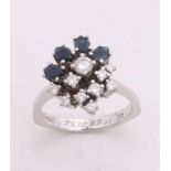 Elegant white gold ring, 585/000, with sapphire and diamond. Ring with 4 marquise-cut sapphires, 5,