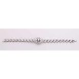 Special white gold bracelet, 750/000, with diamond. Bracelet with floral links with an oval