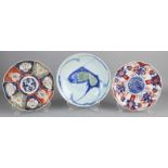 Three times Japanese porcelain plates. Twice Imari, floral, 19th century. One time Chinese /