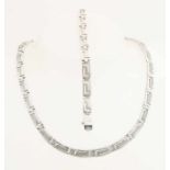 Silver necklace and bracelet, 925/000, with a meandering link with a matted finish. width 6.5 mm.