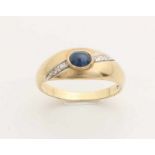 Golden ring, 585/000, with sapphire and diamonds. Convex ring with an oval cabouchon cut blue