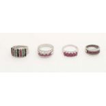 Four silver rings, 925/000, a wide ring with rows of ruby, emerald and sapphire, ø 63, a wide ring