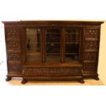 Very large antique walnut Italian Renaissance-style removable display cabinet with two wood doors,