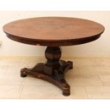 Large early 19th century mahogany Empire table with three-legged arm. Circa 1830. Size: 77 x 129