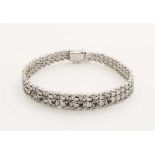 Silver bracelet, 835/000, braided model, in width, with poly and matt finish, set with 7 blue