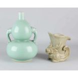 Two old Chinese porcelain vases. Among others: Brown vase with crackle glaze with mythical +